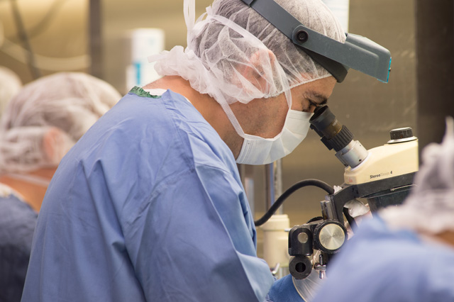 technician in rodent surgery suite. Charles River offers rodent surgery and surgical models