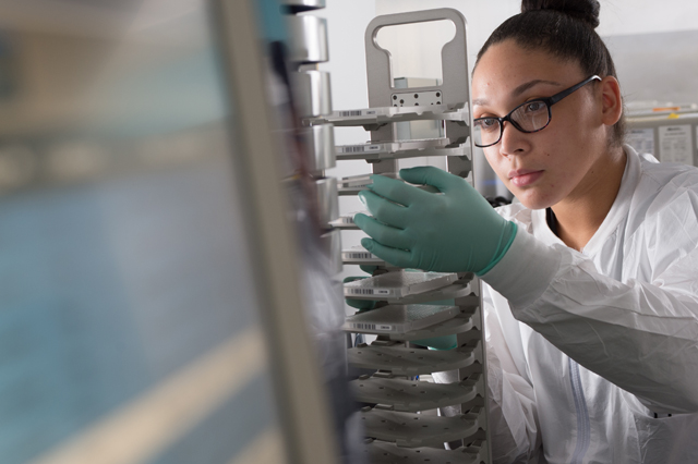 scientist working in biologic drug development testing lab