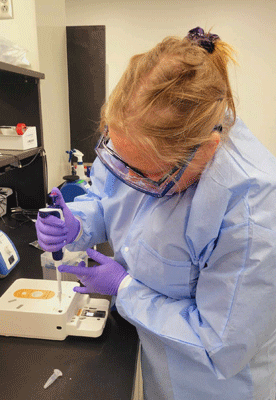 Debbie Letham in Next-Gen Seq Lab