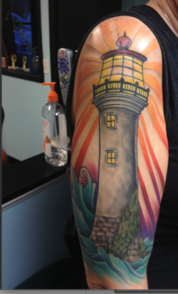 Tattoo of a lighthouse