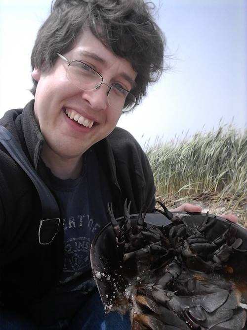 James Lamsdell, PhD, holding a horseshoe crab.