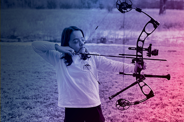 Photo of Evie shooting a bow and arrow at a target out of frame overlaid with Vital Science colors.