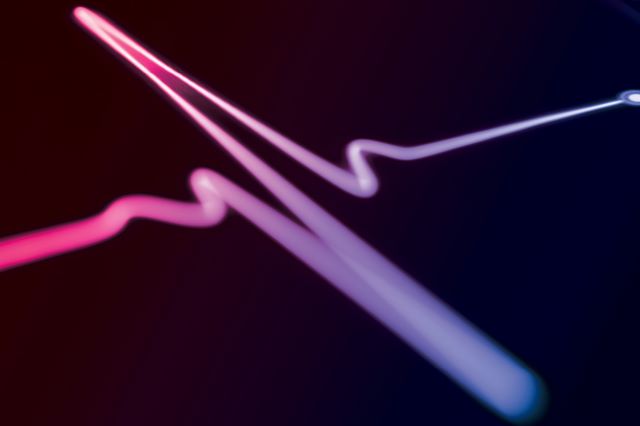 Illustration of a heartbeat on a monitor overlaid with Vital Science colors.