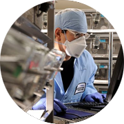 Pharmacokinetics is a key component of DMPK ADME studies. A male technician in safety gear reviews dosing and sampling of studies to determine the pharmacokinetic profile of promising compounds. Standard data generated includes time to Cmax, tmax, t1/2 elimination, and AUC.