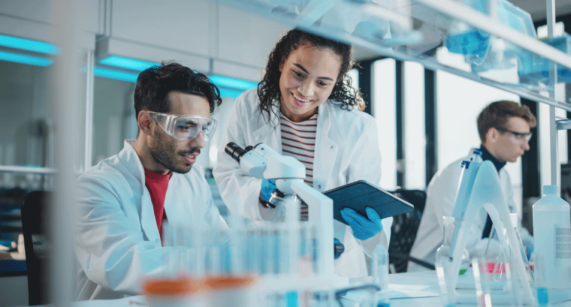 Young scientists working in a high-tech lab.