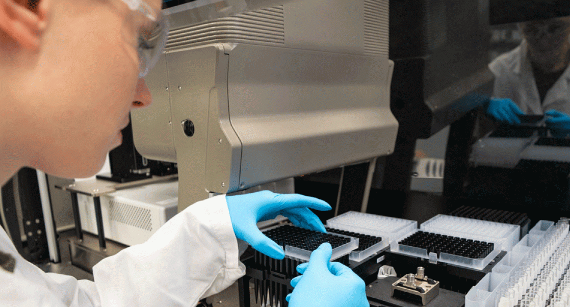 Scientist working in a next gene lab using automation