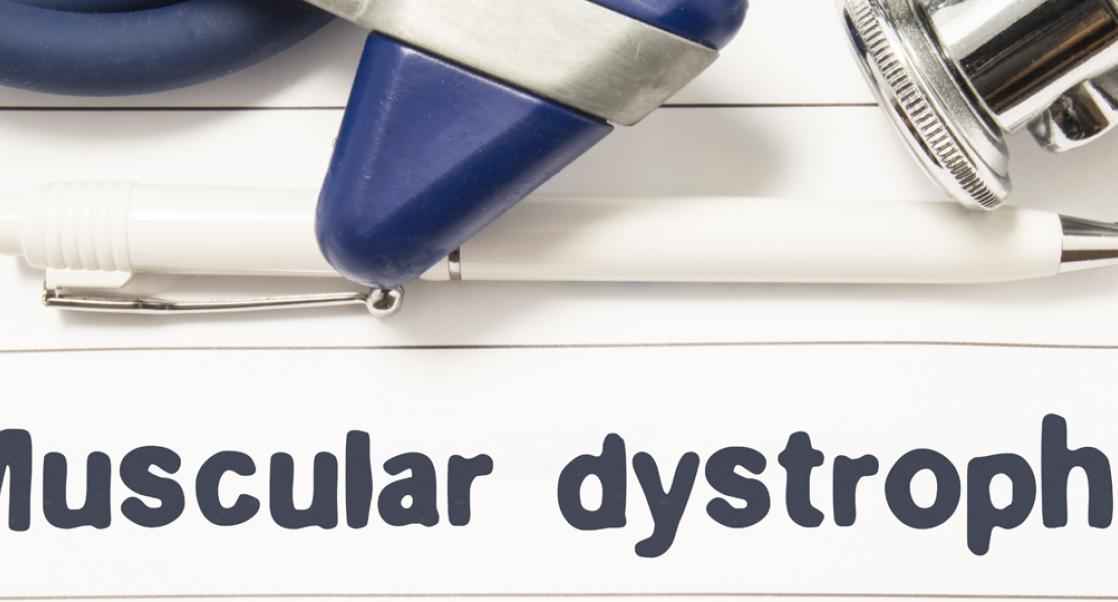 doctor's instruments on notebook with muscular dystrophy written on it